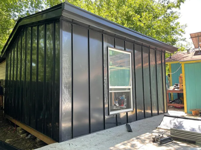Black standing seam metal wall panels for Roof Inspection in Vero Lake Estates