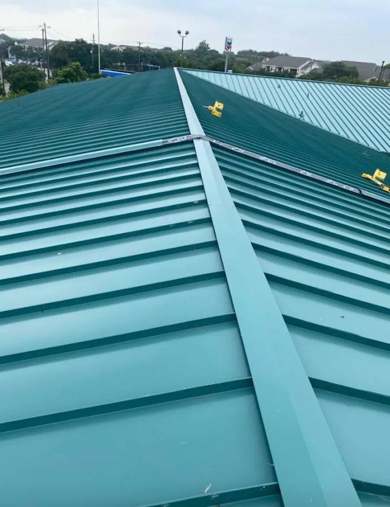 Green commercial metal roof ridge and valley for Metal Roof Repair in Vero Lake Estates